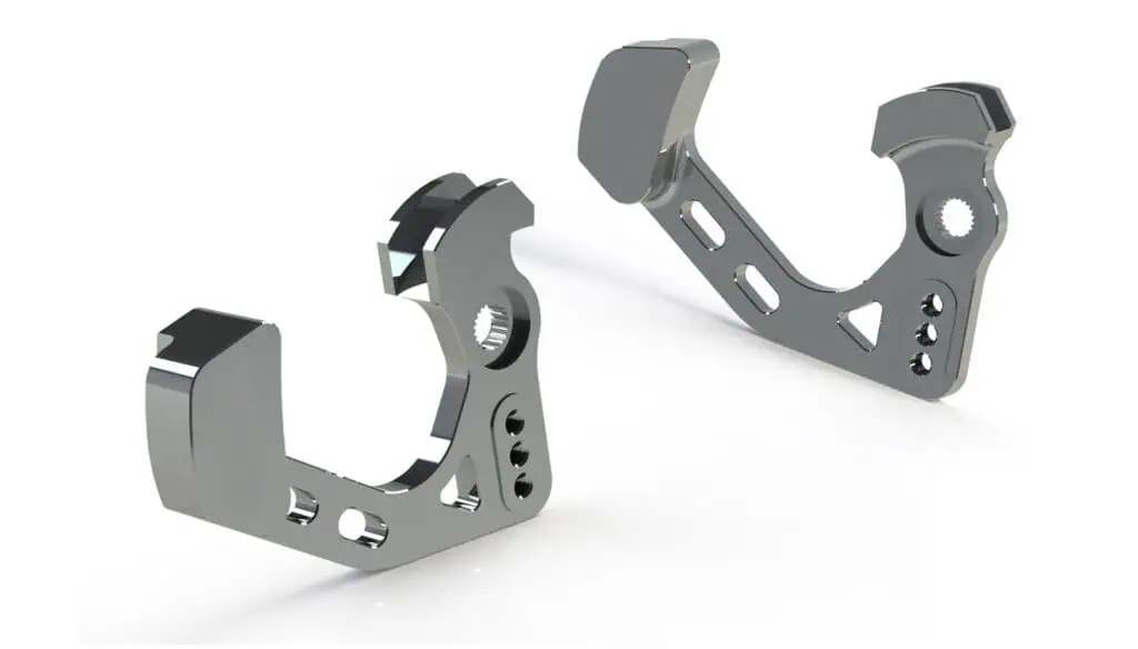 Two metallic, L-shaped mechanical components with smooth, reflective surfaces, multiple holes, and cutouts, positioned upright on a white background. The parts appear engineered for precision assembly.