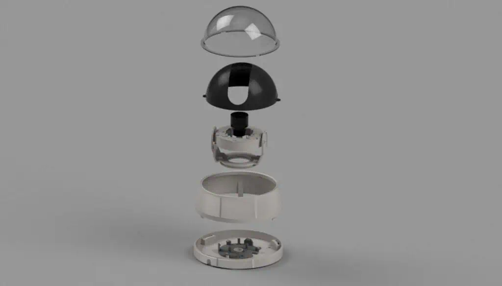 An exploded view of a dome-shaped security camera, showing its clear cover, black inner shell, lens assembly, electronics, white casing, and base, all separated and aligned vertically on a gray background.