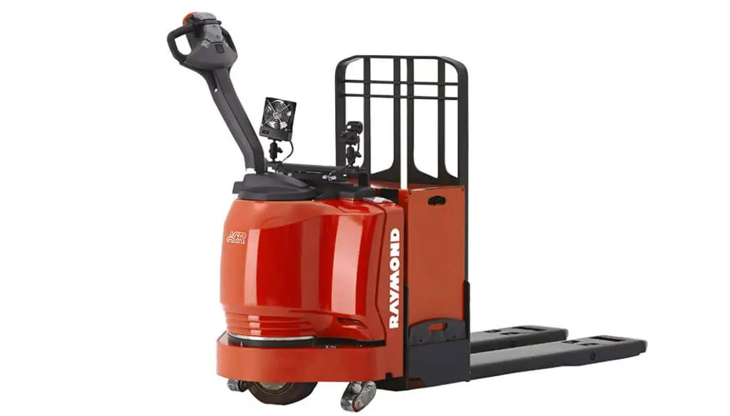 A red electric pallet jack with black handles and controls, featuring the brand name Raymond on the side, designed for moving pallets in warehouses or industrial settings.