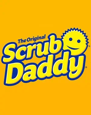 The Scrub Daddy logo features bold blue and yellow text reading The Original Scrub Daddy with a smiling, sun-shaped sponge character replacing the “a” in Daddy, set against a bright yellow background.