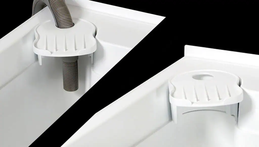 Two white plastic corner sink drain guards are shown; one with a flexible hose inserted through a hole, the other empty, both fitted over the sink corner to help manage drainage or prevent clogs.